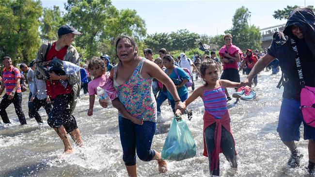 Children go missing as USbound refugees clash with Mexican forces