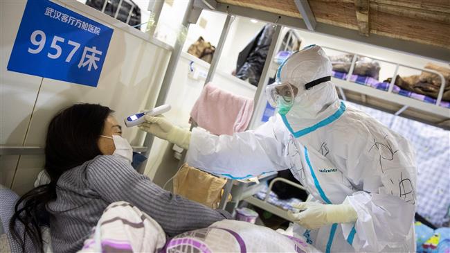 China coronavirus fatalities pass 2, 000 as infection cases decline
