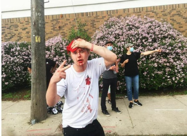 Minneapolis police station torched as protests grow over police killing of black man + films and photos