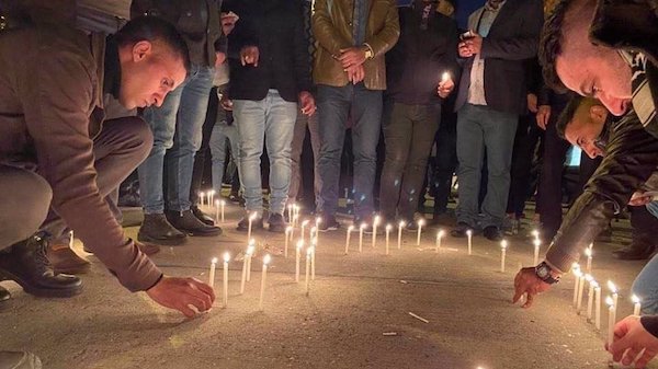 In pictures: Iraqis converge on Baghdad airport to remember Soleimani, Muhandis on assassination anniv.