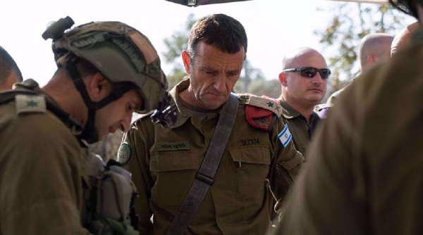 Israel delaying its Gaza invasion to let US boost defense for protection of its troops in region: US media