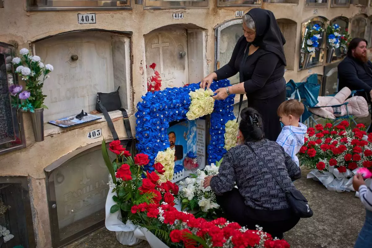 Halloween and a declining Christian tradition coexist on All Saints` Day in Spain