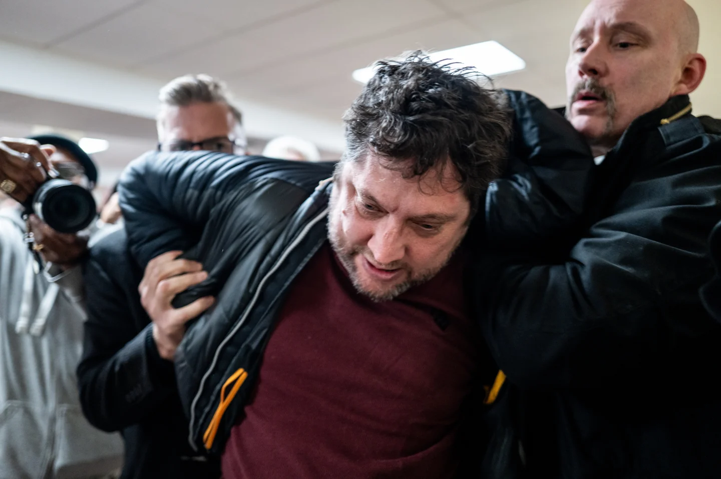 Man lunges at Rep. Ilhan Omar during town hall and tries to spray her with unknown substance