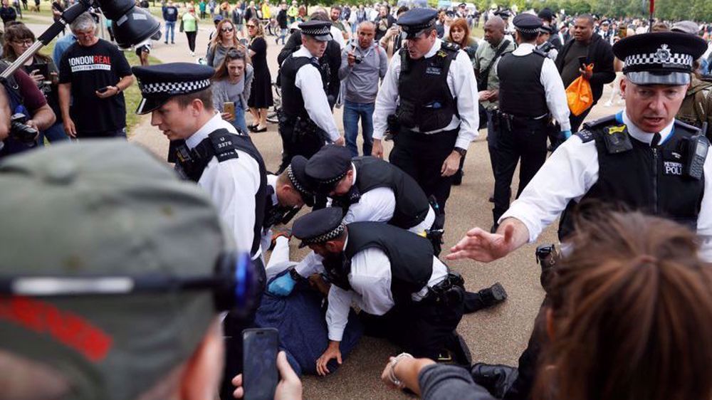 British police arrest 19 at London protest against social distancing