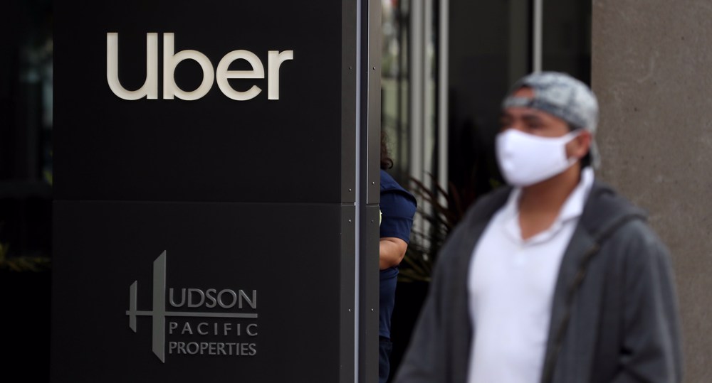 Uber laying off another 3,000 workers, trimming investment amid US virus crisis