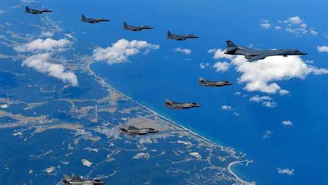  US bombers fly off N Korea coast, Pyongyang calls war inevitable