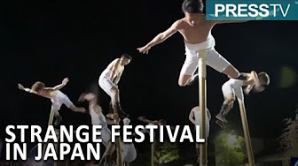 Watch: Men atop poles in strange festival in Japan